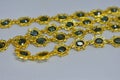 Gold necklace Decorated with genuine emerald stones