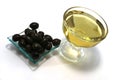 Gold olive oil with black olives