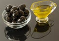 Gold olive oil with black olives Royalty Free Stock Photo