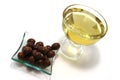 Gold olive oil with brown olives Royalty Free Stock Photo