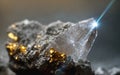 Gold ore embedded in a white rock quartz crystal. Close up