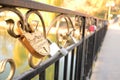 Gold pad lock symbol of love on the bridge