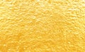 Gold paint cement wall rough patterns on background Royalty Free Stock Photo