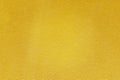 Gold paint on rough cement wall texture background Royalty Free Stock Photo
