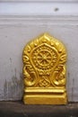 Gold painted architectural detail on an ancient Buddhist temple in Luang Prabang, Laos