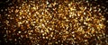 Gold particles abstract background with golden shining stars dust bokeh glitter awards dust. Futuristic glittering fly movement fl Royalty Free Stock Photo