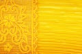 Gold peach lace sits on a gold silk Royalty Free Stock Photo