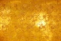 Gold peach lace sits on a golden texture background