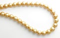 Gold pearl chain Royalty Free Stock Photo