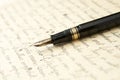 Gold Pen with Letter and Writing Royalty Free Stock Photo