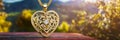 gold pendant in the shape of a heart. Selective focus. Royalty Free Stock Photo