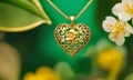 gold pendant in the shape of a heart. Selective focus. Royalty Free Stock Photo