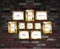 Gold photo frames on a brick wall background Royalty Free Stock Photo