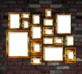 Gold photo frames on a brick wall background Royalty Free Stock Photo