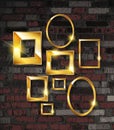 Gold photo frames on a brick wall background Royalty Free Stock Photo