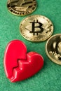 Gold physical Bitcoin, Litecoin and Ethereum coins with broken heart