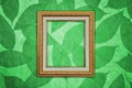 Gold Picture Frame on Green Leaves Pattern