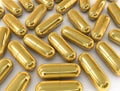 Gold pill capsule