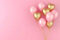 Gold and pink balloons. Realistic rose 3d heart balloon. Helium balloon illustration on pink background. Royalty Free Stock Photo