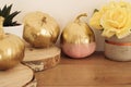 Gold and pink colored pumpkins. Fall concept