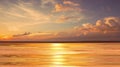 Gold  pink sunset  on the beach ,sun beach light  sand and  gold sea water reflection at evening  summer nature landscape Royalty Free Stock Photo