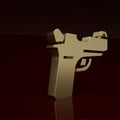 Gold Pistol or gun icon isolated on brown background. Police or military handgun. Small firearm. Minimalism concept. 3D