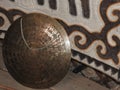 Gold-plated Asian Gong in Mongolia. Ritual, rites