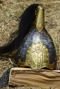 Gold plated decorative medieval conical helmet with black ponytail comb and embossed slavic christian motives