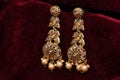 Gold plated jewelry -Fancy Designer golden earrings macro image