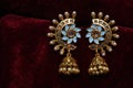 Gold plated jewelry -Fancy Designer golden earrings macro image