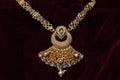 Gold plated jewelry -Fancy Designer golden long pendant-set closeup macro image