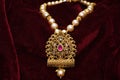 Gold plated jewelry -Fancy Designer golden long pendant set closeup macro image