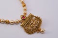 Gold plated jewelry -Fancy Designer golden long pendant macro image