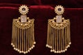 Gold plated jewelry - Fancy Designer long and heavy earrings closeup macro image