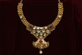 Gold plated jewelry - Front view of Fancy Designer golden neck-set closeup macro image