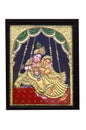 Gold plated krishna and radha painting Royalty Free Stock Photo