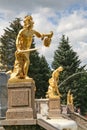Gold plated sculptures by fountains Grand cascade in Pertergof, Saint-Petersburg, Russia Royalty Free Stock Photo