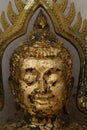 Gold plates on face buddha,The Buddha statue to gild with gold l