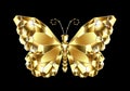 Gold polygonal butterfly on black background Royalty Free Stock Photo