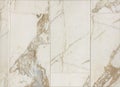Gold porcelain floor and wall tile texture with marble pattern Royalty Free Stock Photo