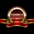 Gold premium quality badge with red ribbon