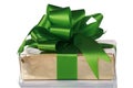 Gold present wrapped with green ribbons Royalty Free Stock Photo