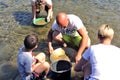 Gold prospectors of all ages on the banks of the Gardon River Royalty Free Stock Photo