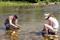 Gold prospectors of all ages on the banks of the Gardon River Royalty Free Stock Photo