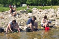 Gold prospectors of all ages on the banks of the Gardon River Royalty Free Stock Photo