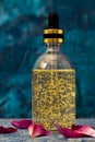 Gold protein peptide solution in a glass bottle