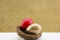 Gold puzzle background for gold and red nest eggs Royalty Free Stock Photo