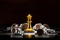 Gold queen chess surrounded by a number of fallen silver chess p Royalty Free Stock Photo