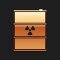 Gold Radioactive waste in barrel icon isolated on black background. Radioactive garbage emissions, environmental