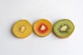 Gold, red and yellow kiwi fruit sliced Royalty Free Stock Photo